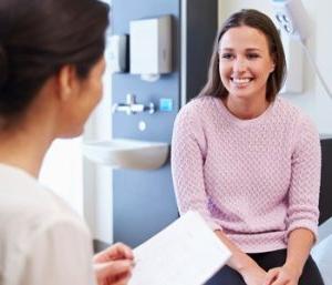 A woman consults with her provider